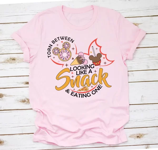 Funny Disney Shirt, Disney Snack Shirts, Disneyland Shirt, Funny Disney Tee, Torn Between Looking Like A Snack And Eating One T-Shirt, Light Pink