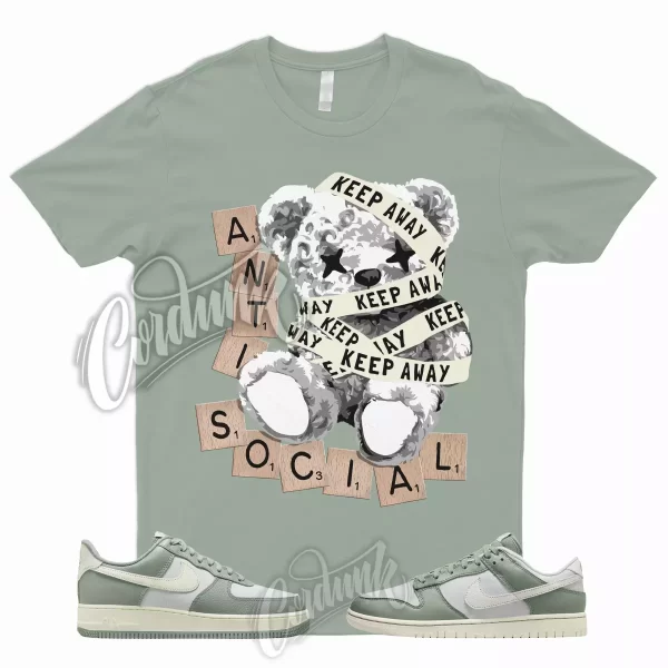 ANTI T Shirt to Match Dunk Low Mica Green Sail Photon Air Force Max Plus LX 1 90 Jezsport.com